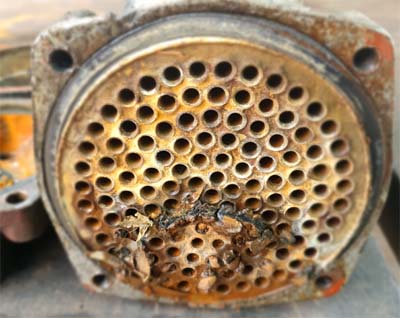 Blocked oil cooler on injection moulding machine